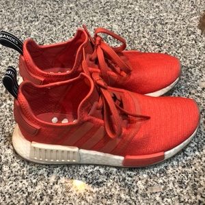 Women’s salmon color Adidas NMD’s size 7.